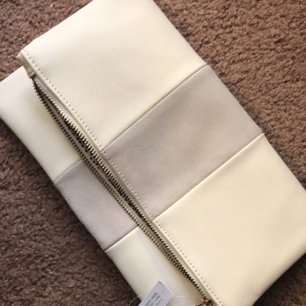 Faux leather clutch with grey suede stripe